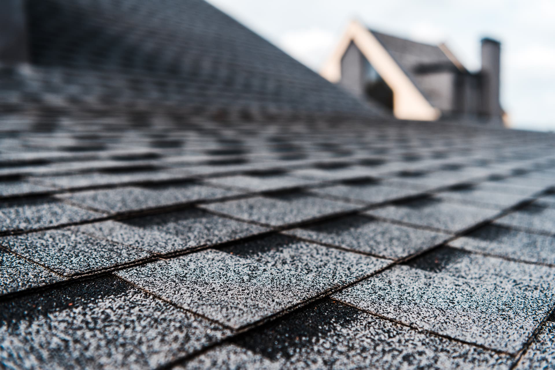 Close view of weathered gray roof shingles