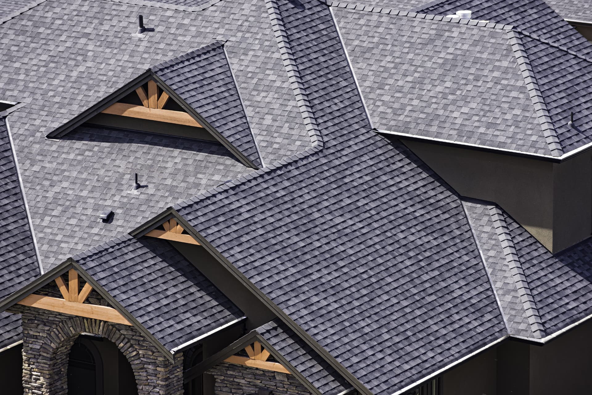 Detailed view of gray shingle rooflines