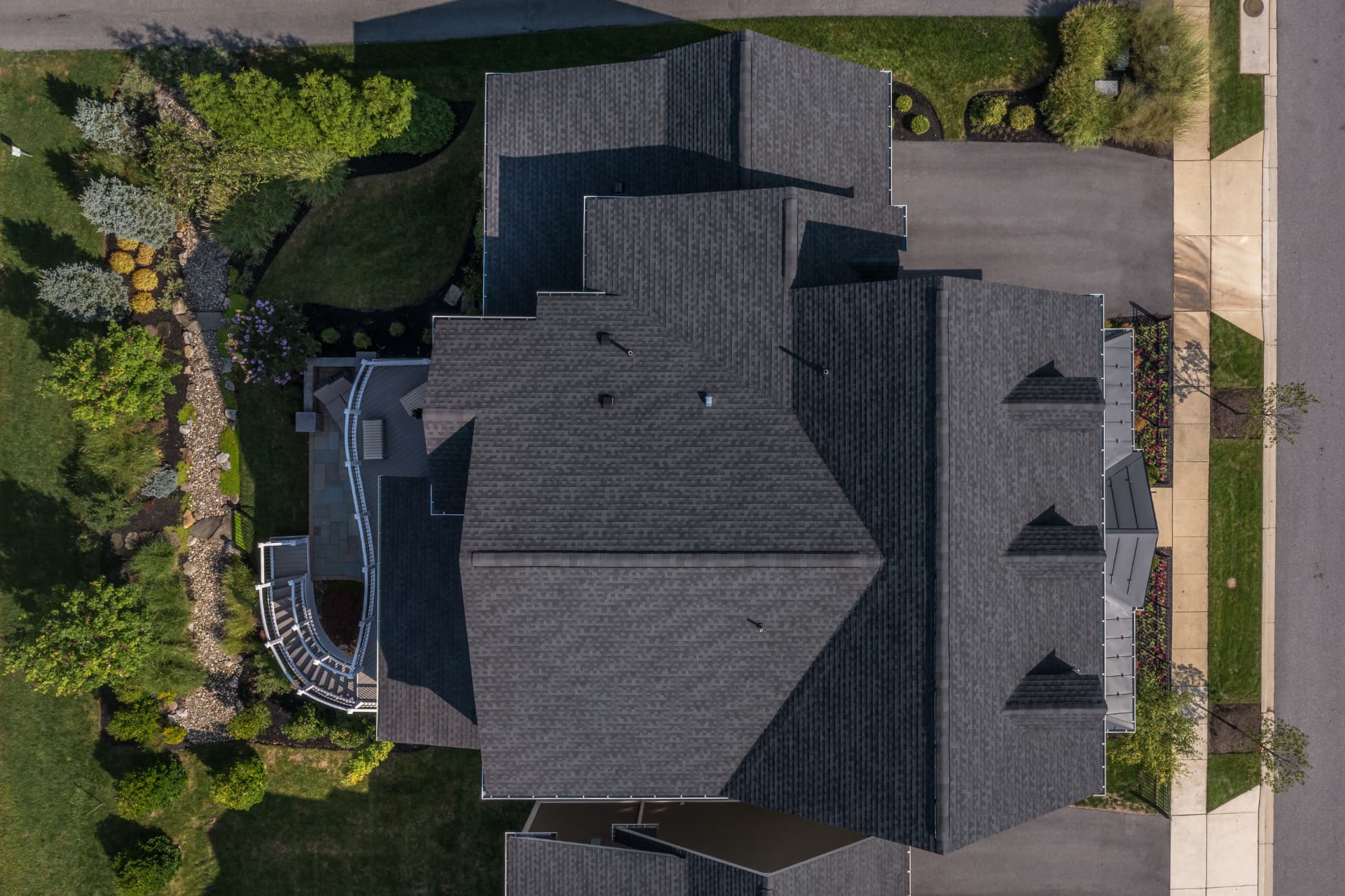 Aerial view of a shingled residential roof